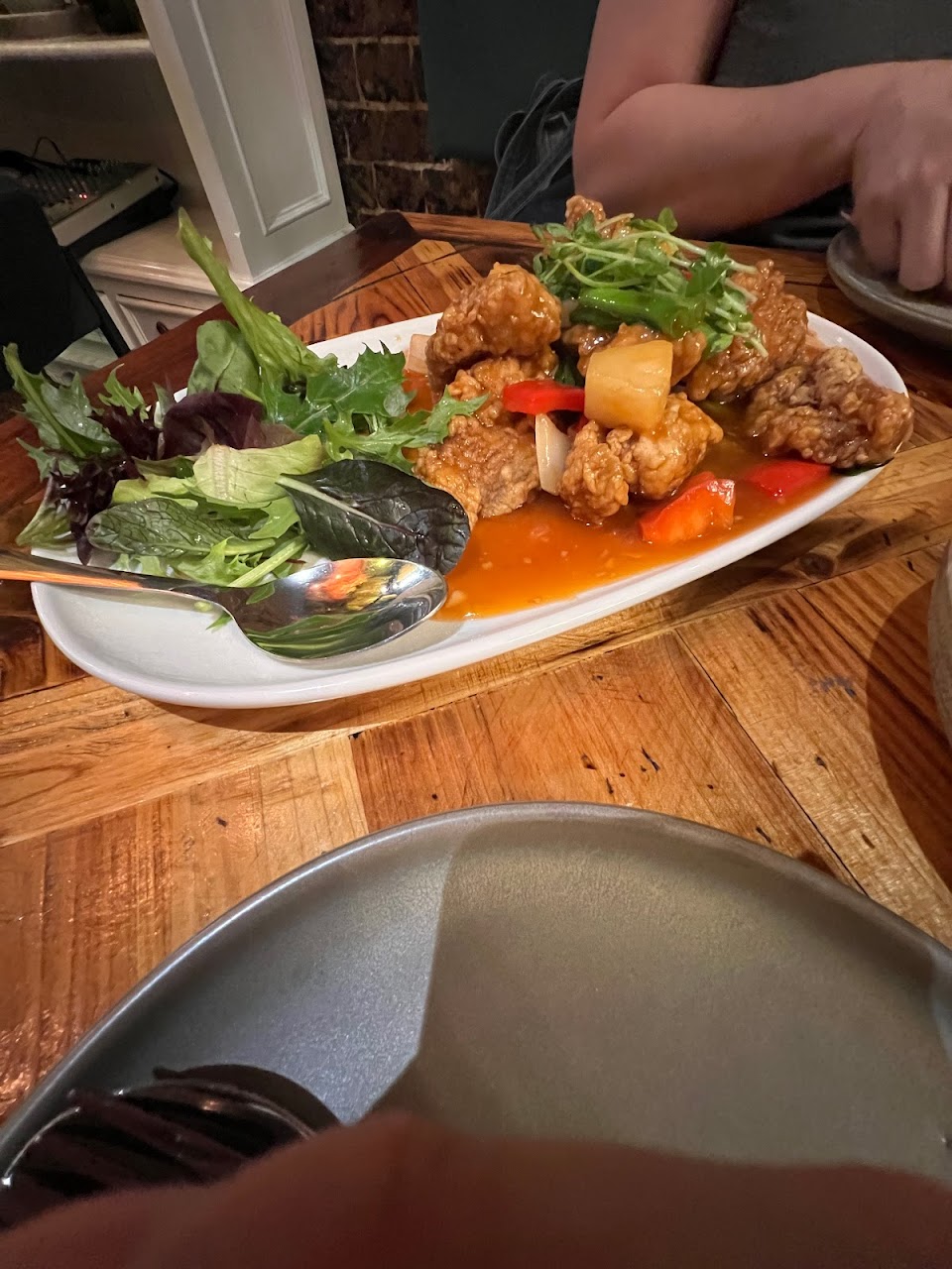 Seafood plate with garnish at Khao Man Kai